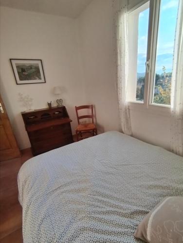 Postel nebo postele na pokoji v ubytování CHAMBRE PRIVEE chez l'HABITANT SALLE d'eau WC Privatifs