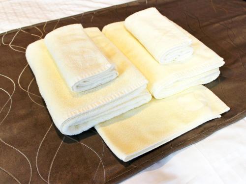 a group of towels sitting on a tray at SA Inn Nagano Nakagosho - Vacation STAY 45404v in Nagano