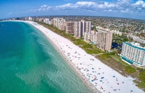 an aerial view of a beach and the ocean at Relaxing Retreat in Sunny Bonita Springs in Bonita Springs
