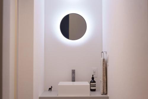 a bathroom with a mirror on the wall at Star-Seven Itoshima - Vacation STAY 20184 in Keya