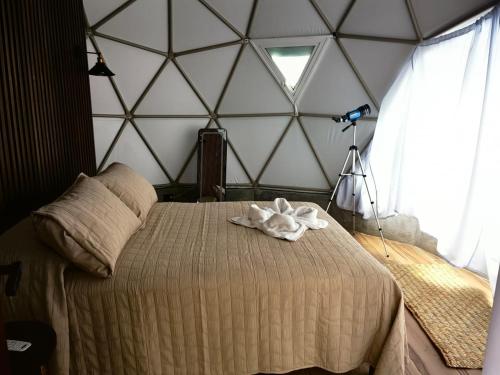 Postel nebo postele na pokoji v ubytování Alma Glamping