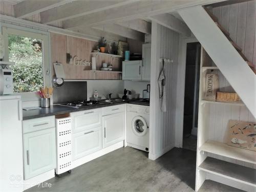 Η κουζίνα ή μικρή κουζίνα στο Maison 6pers Guidel Plage