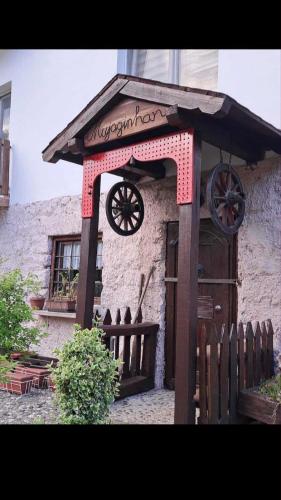 a building with awning on the side of it at Mujagin Han in Srebrenica