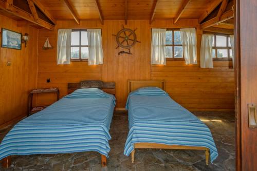 Ένα ή περισσότερα κρεβάτια σε δωμάτιο στο Nikos Panagiotareas House