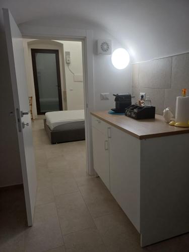 Una cama o camas en una habitación de Dimora Marte