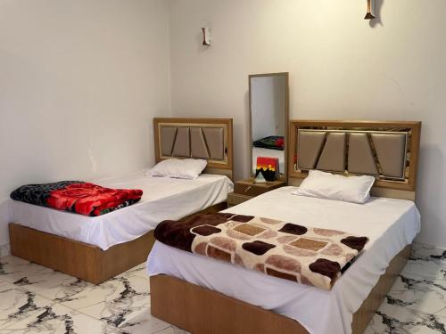 Postel nebo postele na pokoji v ubytování Morsy Palace