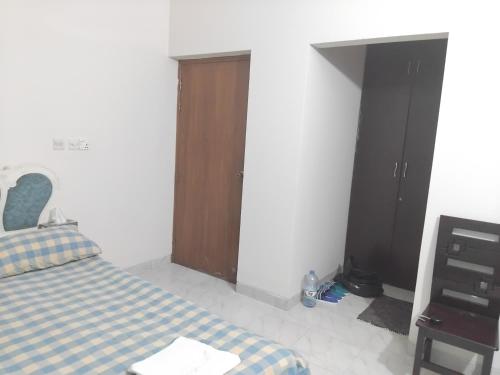 Tempat tidur dalam kamar di Peacefully