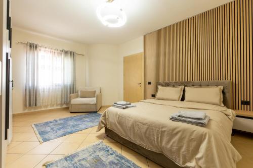 Postel nebo postele na pokoji v ubytování Mandi Apartament
