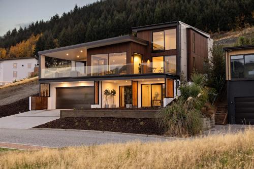 a house with a view of the front of it at Elevated Tranquility Luxe Lakeview Horizons in Queenstown