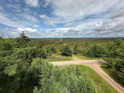 an overhead view of a dirt road in a field at 6 person holiday home in Hovborg-By Traum in Hovborg