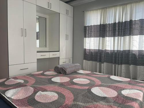 Ένα ή περισσότερα κρεβάτια σε δωμάτιο στο Urban Oasis