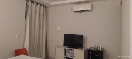 Et tv og/eller underholdning på Pousada Horbis