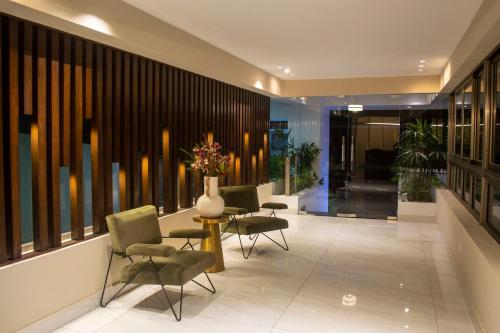 Posezení v ubytování Burungos Place at Britney Tower IV C-5