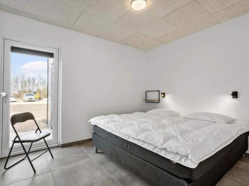 Postel nebo postele na pokoji v ubytování 4 star holiday home in Ringkøbing