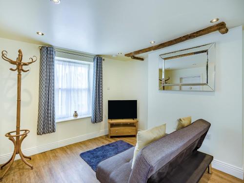 Televiisor ja/või meelelahutuskeskus majutusasutuses Oak Tree Cottage