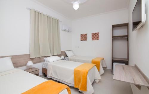 Katil atau katil-katil dalam bilik di Hotel Araçari