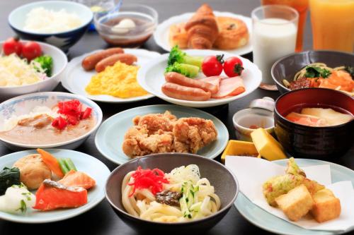 a bunch of plates of food on a table at Aishinkan in Morioka