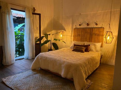 A bed or beds in a room at Casa Yohual