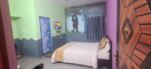 Postel nebo postele na pokoji v ubytování Hotel Sai Palace