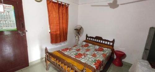 Ένα ή περισσότερα κρεβάτια σε δωμάτιο στο Nanavu Farmhouse