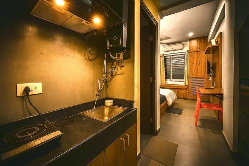 Kuchyň nebo kuchyňský kout v ubytování Premium 1RK Studio Apartment in Puri