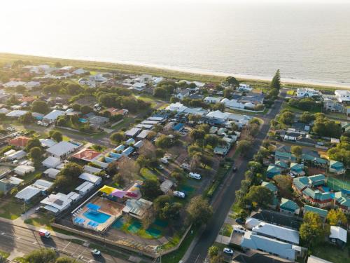 an aerial view of a suburb next to the water at BIG4 Breeze Holiday Parks - Busselton in Busselton