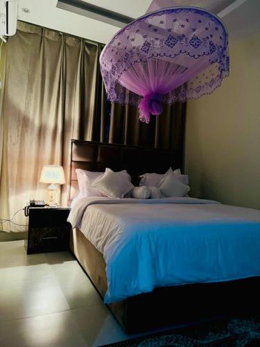 Ένα ή περισσότερα κρεβάτια σε δωμάτιο στο Gulaid Park Hotel