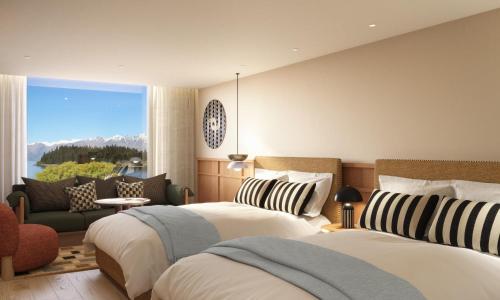Postel nebo postele na pokoji v ubytování QT Queenstown