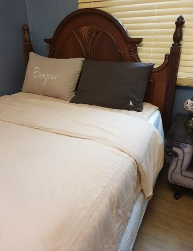 Ένα ή περισσότερα κρεβάτια σε δωμάτιο στο sunset