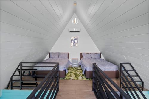 Ένα ή περισσότερα κρεβάτια σε δωμάτιο στο Junglo Resort and Spa