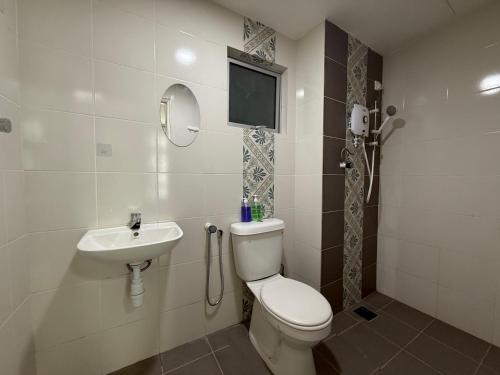 a bathroom with a toilet and a sink at Suite For 5pax The Anderson Residence Ipoh #57 in Ipoh