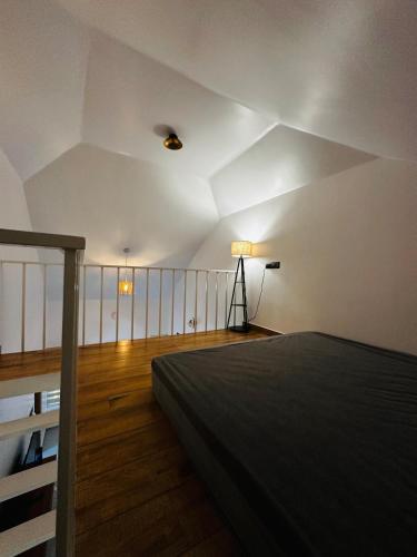 a bedroom with a bed and a balcony at ThunderHill by Casablanca - A Premium Pool Villa in Meenangadi