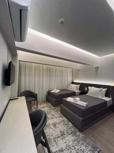 Ένα ή περισσότερα κρεβάτια σε δωμάτιο στο The Museum Of The Pyramids