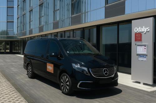 a black van parked in front of a building at Appart Hotel Odalys City Toulouse Centre Compans Caffarelli in Toulouse