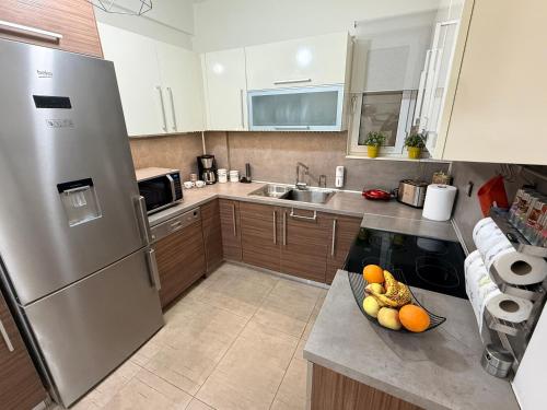 Kuchyň nebo kuchyňský kout v ubytování 800 steps from MAGIC - ΤΟ ΚΕΝΤΡΟ ΣΤΑ ΠΟΔΙΑ ΣΟΥ