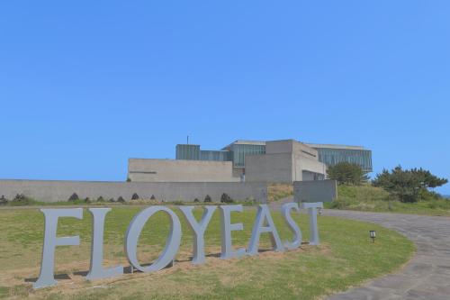 a sign in front of the argentinian argentinian soccer stadium at Phoenix Island in Seogwipo