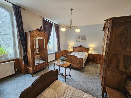 Postel nebo postele na pokoji v ubytování Gite du theil au servant