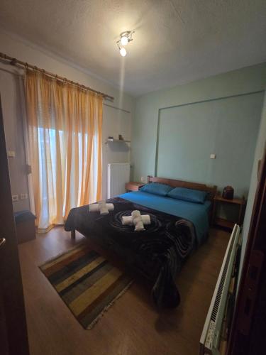 Postel nebo postele na pokoji v ubytování GiannisHouse