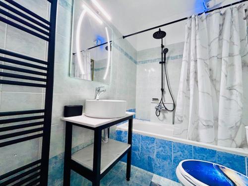 Ένα μπάνιο στο ITHACA 3rd floor apartment with a view