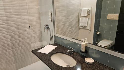 Ένα μπάνιο στο Country Hotel Borromeo