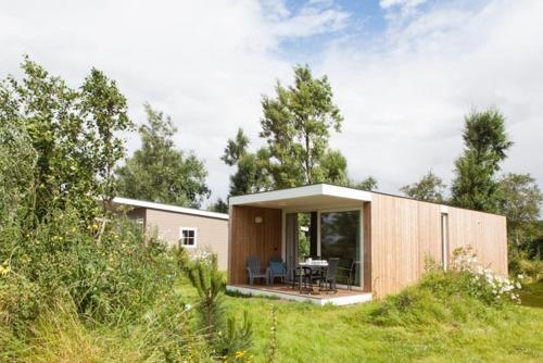 Κήπος έξω από το Design Cabin Sint Maartenszee