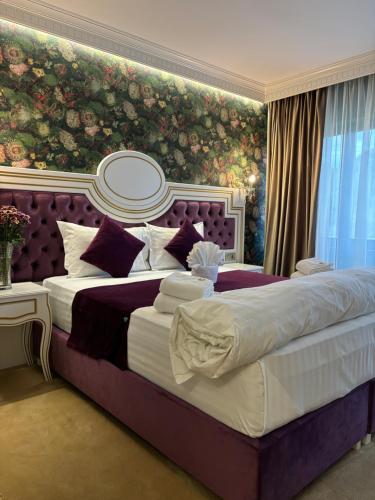 Ένα ή περισσότερα κρεβάτια σε δωμάτιο στο Cardinale Resort