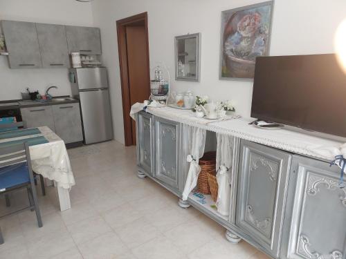 Kuchyň nebo kuchyňský kout v ubytování Il Nibbio