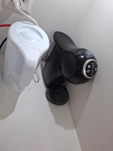 a game controller is attached to a wall at My Room Luzern in Lucerne