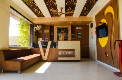 Μια τηλεόραση ή/και κέντρο ψυχαγωγίας στο Hotel Shree Vallabh