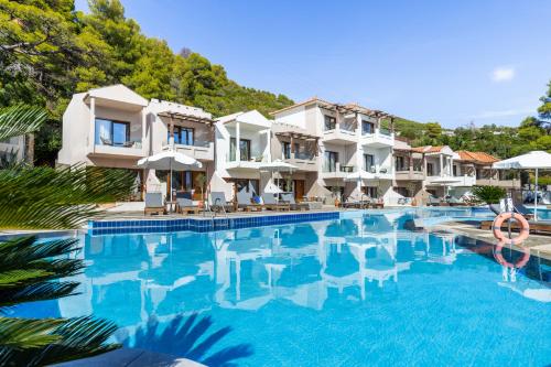 an image of a swimming pool at a resort at Blue Green Bay in Panormos Skopelos