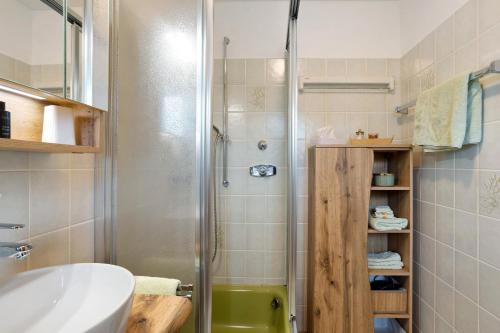 a bathroom with a shower and a sink at Ferienwohnung Wald-Ausblick in Willingen