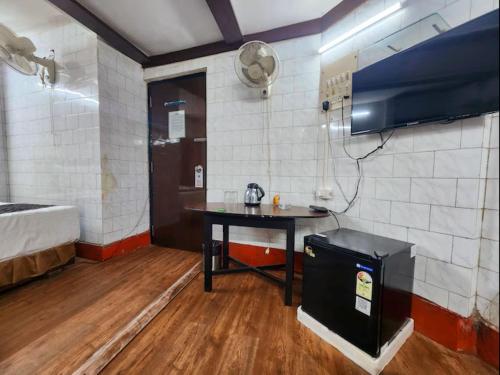 TV a/nebo společenská místnost v ubytování Hotel Raunak