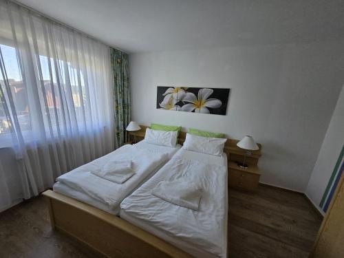 Ένα ή περισσότερα κρεβάτια σε δωμάτιο στο Apartmenthaus Usedom