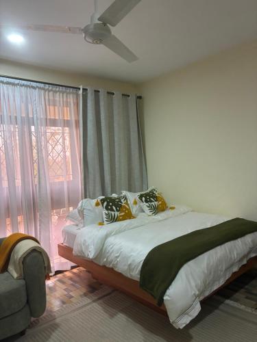 Ένα ή περισσότερα κρεβάτια σε δωμάτιο στο Star bnb